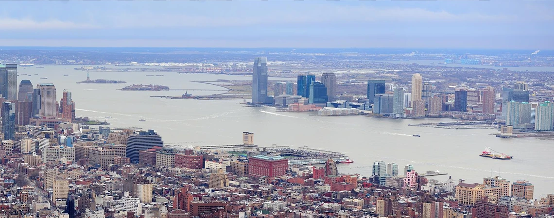 Discover top attractions in Newark with Newark car service, image featuring a scenic view of the city skyline and Prudential Center, ideal for visiting Branch Brook Park's cherry blossoms and the New Jersey Performing Arts Center (NJPAC) with luxury black car travel.