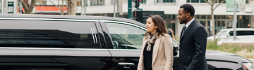 JFK Limo service for milestone birthdays: an elegant group arriving in a luxury stretch limousine with limo service to JFK, celebrating special occasions in style with champagne and city views.